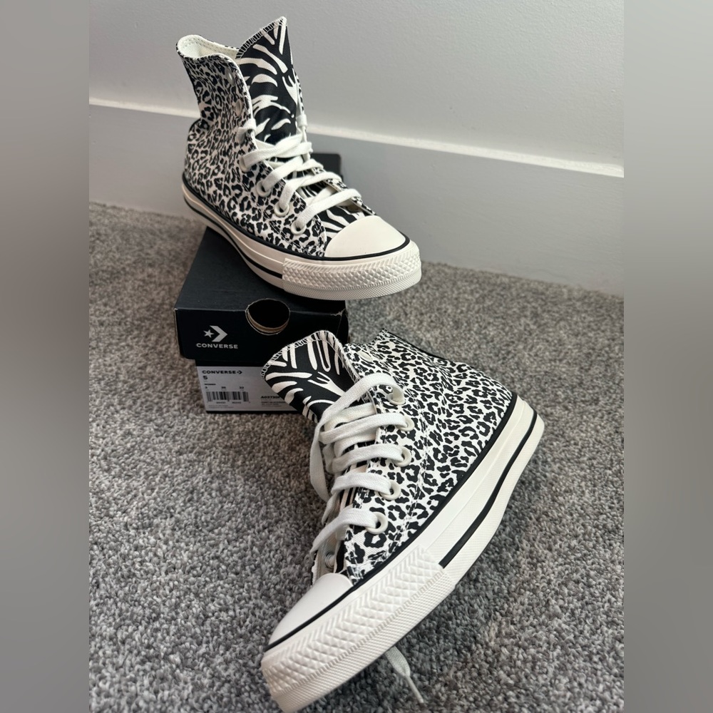 Converse All Stars animal print. Brand New Size 5 women’s size 3. Never worn.